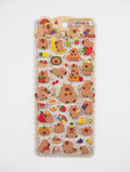 Pack of transparent stickers with cartoon animal characters and food items on a white background